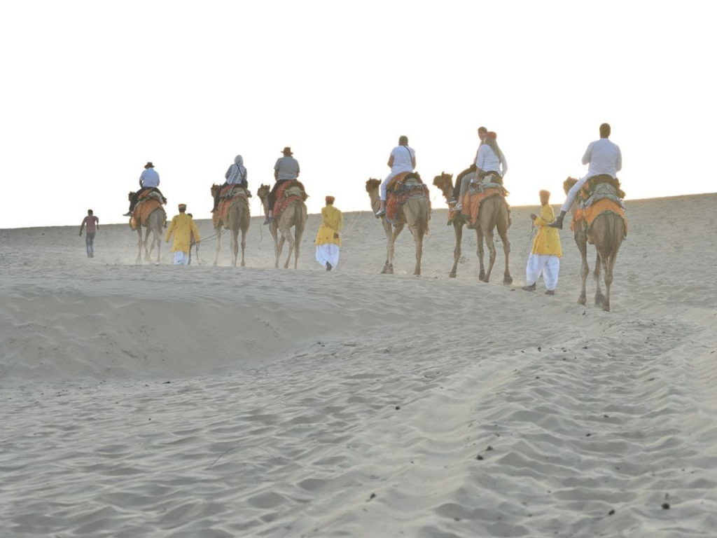 Palace on Wheels Guest Doing Camal Safari at Lohagarh Desert Resort